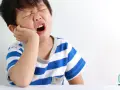 Dziecko boli ząb? Sprawdzone domowe sposoby i kiedy do dentysty